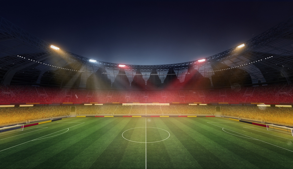 Empty,Soccer,Filed,,Stadium,With,Spotlight,And,Fan,Tribune.,Germany